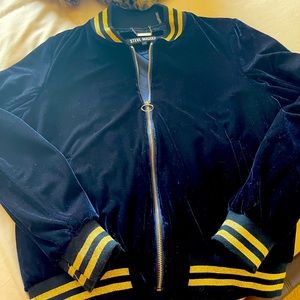 Cute velvet jacket with silk lining.